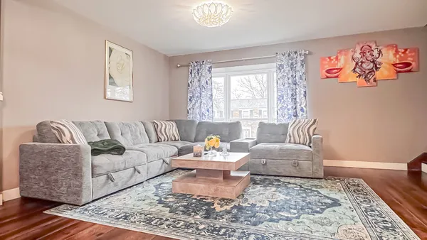 a living room with furniture and a couch