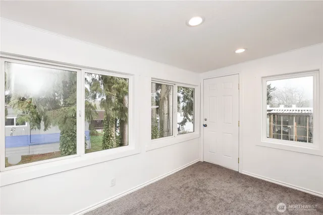 an empty room with windows