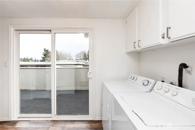 a utility room with a washer and dryer