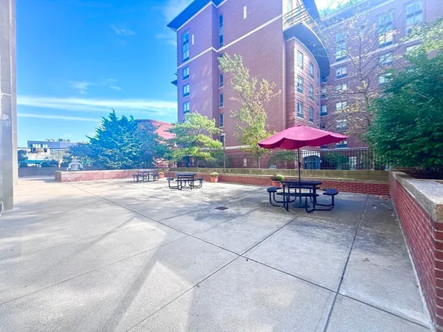 a kitchen with a refrigerator sink and microwave