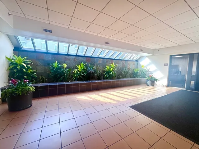 a view of balcony with furniture