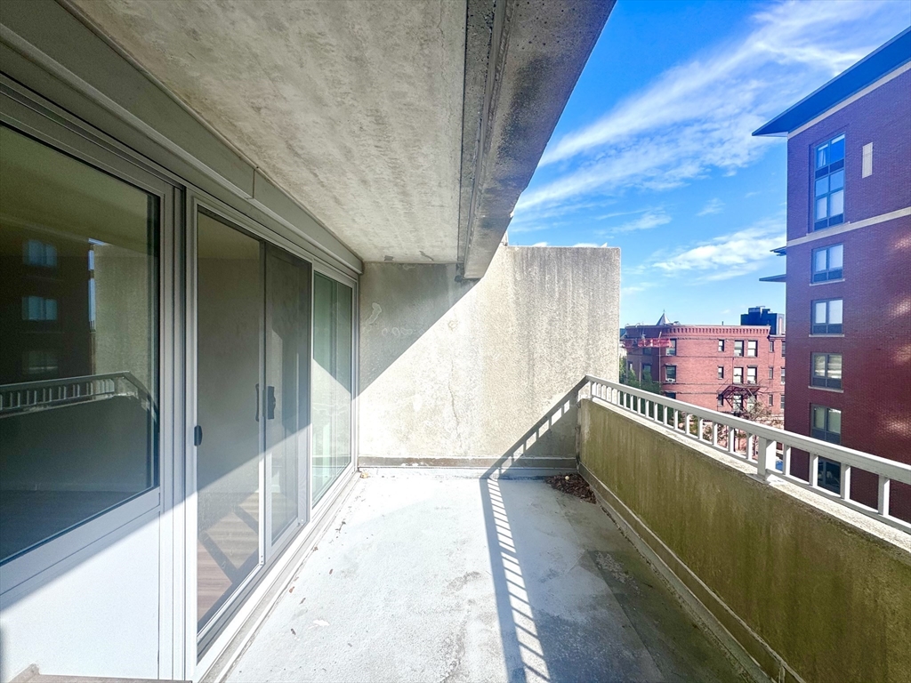 133 Park Street, Unit 404 Brookline, MA 02446 - Photo 10 of 25 a view of balcony and deck