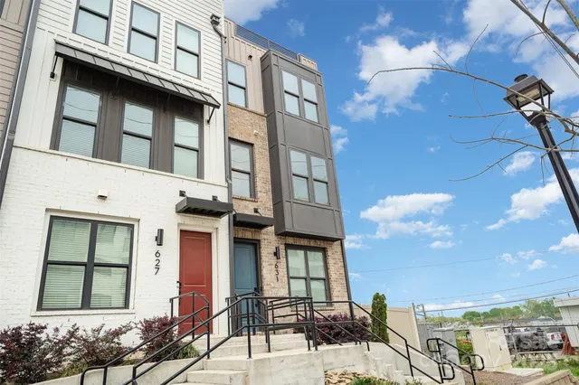 a front view of a multi story residential apartment building