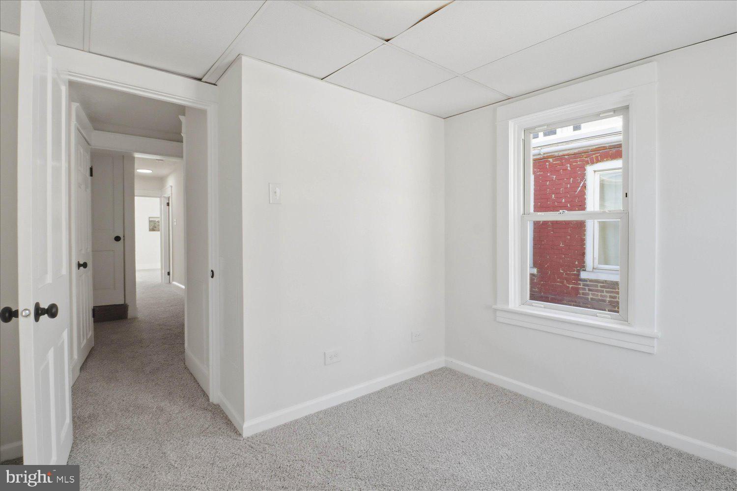 27 West New Street Lancaster, PA 17603 - Photo 18 of 29 an empty room that has a window