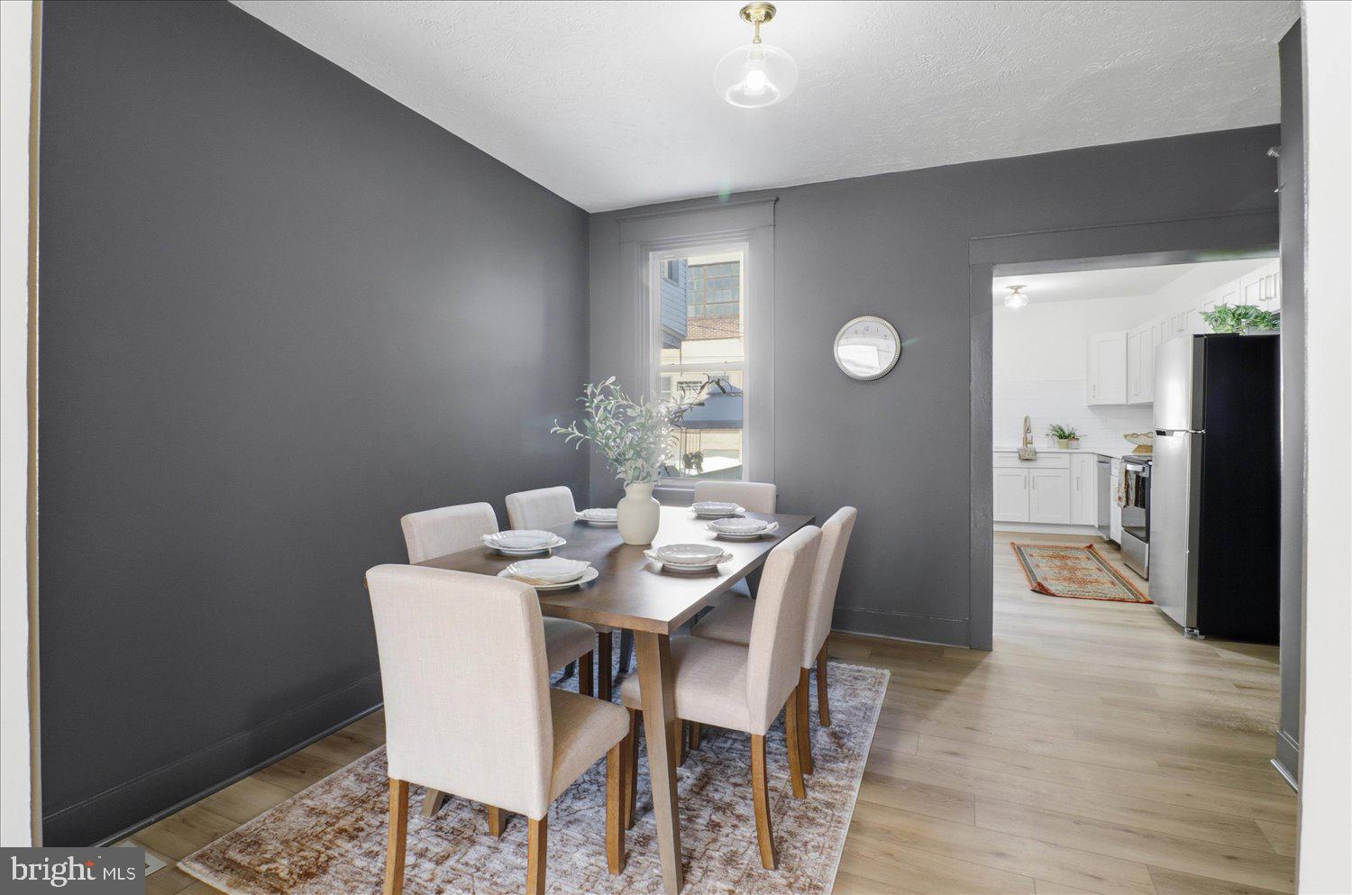 27 West New Street Lancaster, PA 17603 - Photo 5 of 29 a view of a dining room with furniture and wooden floor