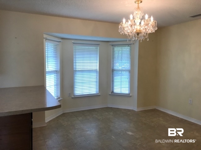 221 Scott Road Brewton, AL 36426 - Photo 4 of 18 Den to Dining Area
