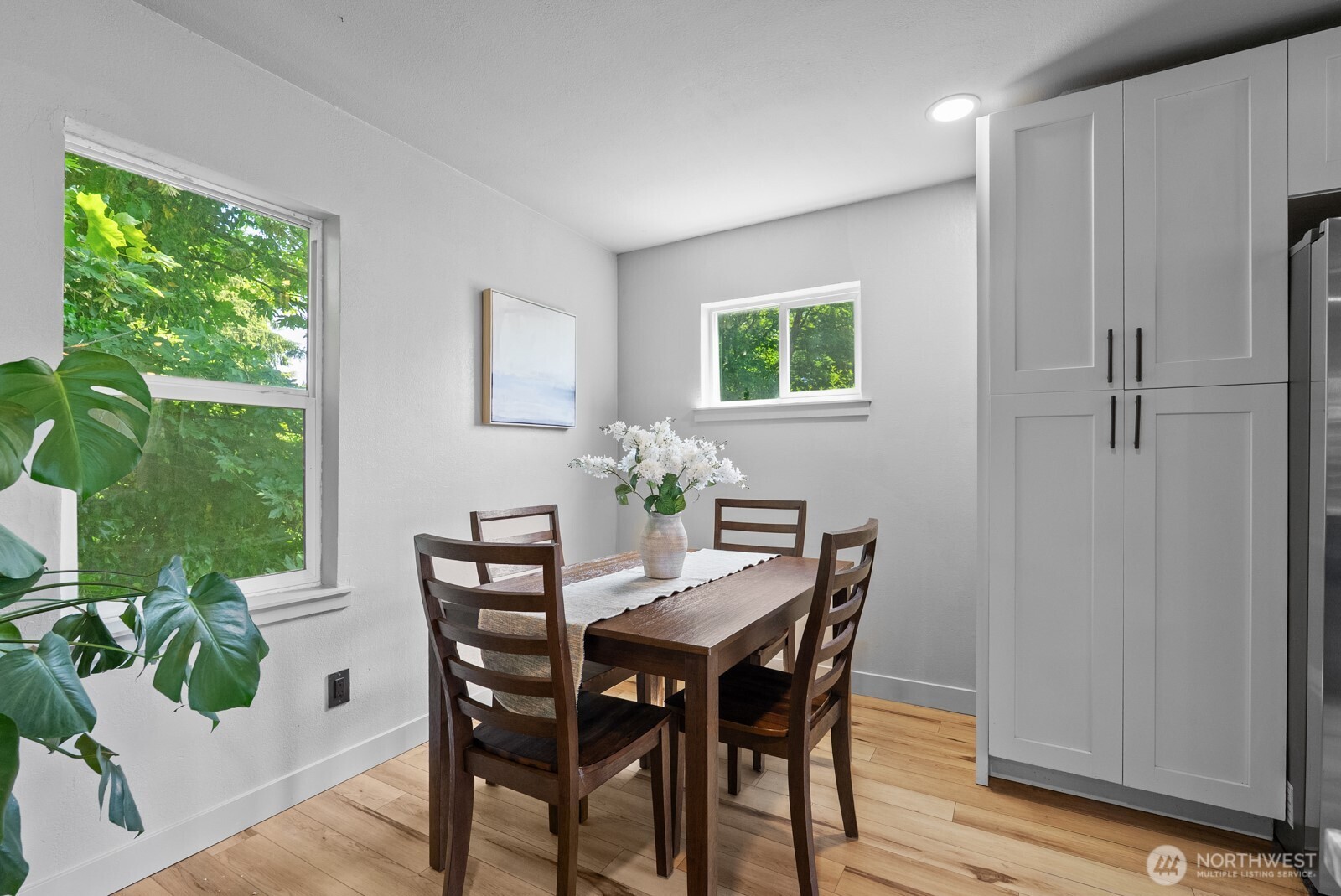 307 4th Street Steilacoom, WA 98388 - Photo 14 of 39 a view of a dining room with furniture window and wooden floor