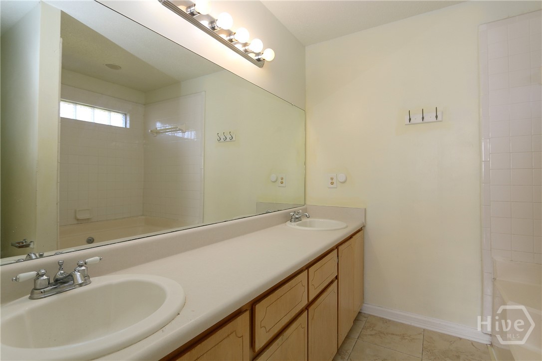 2352 Rowe Street Hinesville, GA 31313 - Photo 16 of 25 Dual vanities in the primary bathroom