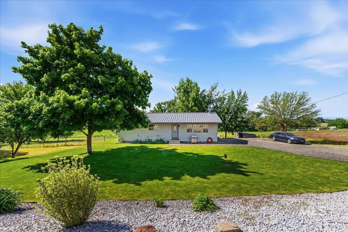 6323 Foothill Road Star, ID 83669 - Photo 2 of 50 Single-story residence featuring a metal roof and light-colored siding