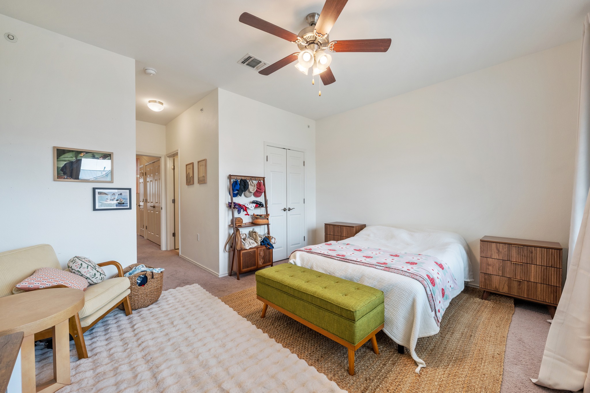 4400 Vaughan Street, Unit B Austin, TX 78723 - Photo 18 of 29 a bedroom with a bed and a chandelier