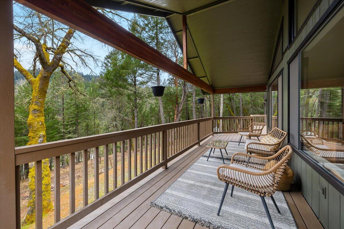 350 Splendor Drive Wilderville, OR 97543 - Photo 38 of 57 a view of a two chair in the balcony