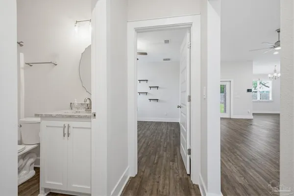 a view of small space with empty racks on the wall
