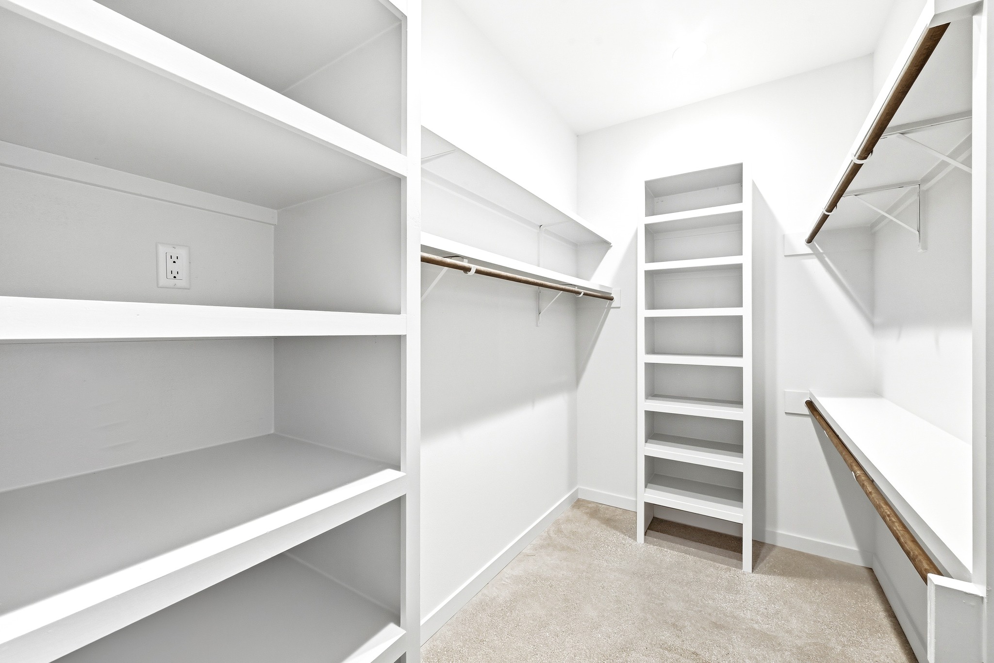 1609 Bauerle Avenue Austin, TX 78704 - Photo 14 of 34 Primary Bedroom walk- in closet with custom built in storage