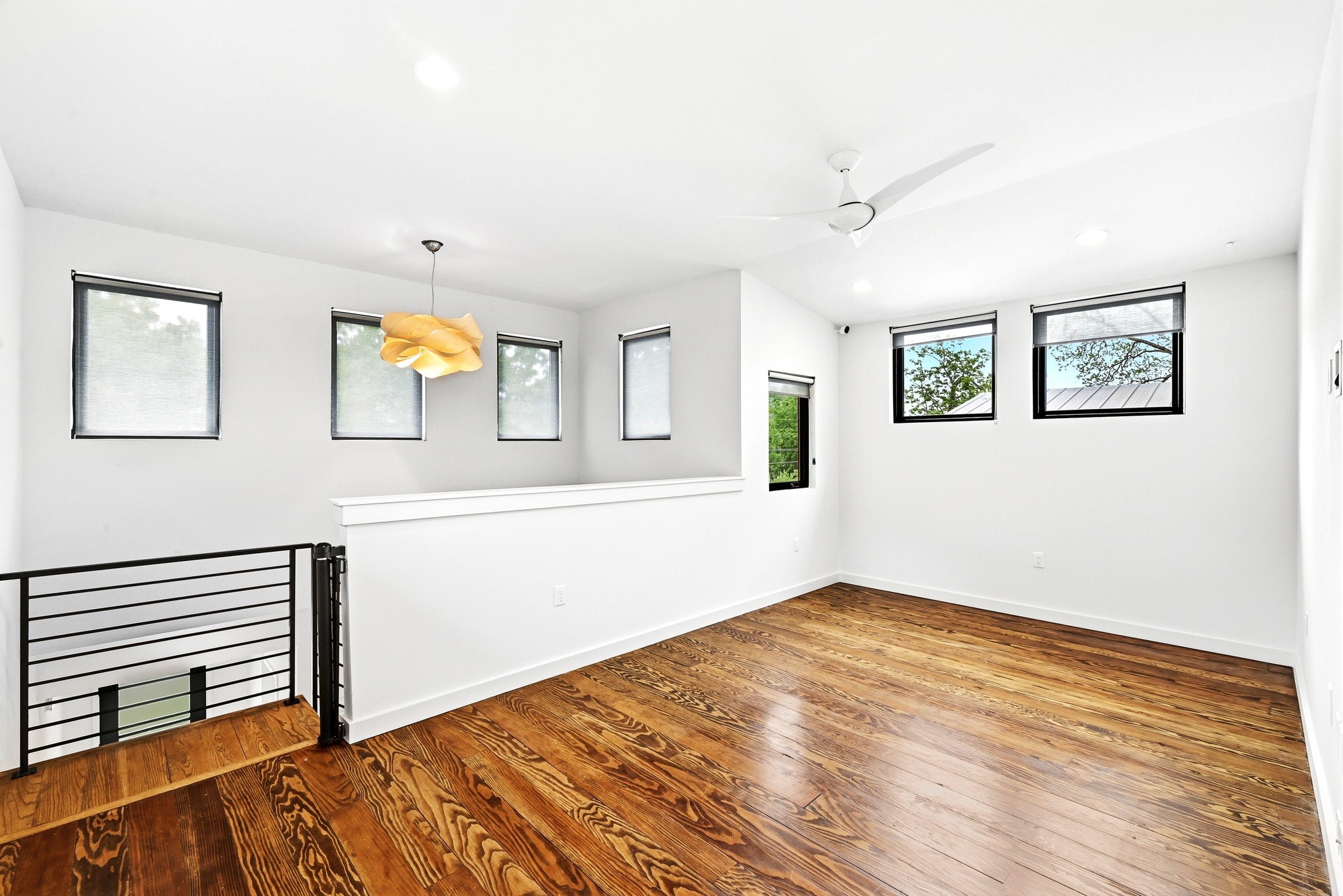 1609 Bauerle Avenue Austin, TX 78704 - Photo 18 of 34 This versatile space features rich hardwood flooring and is wired for media