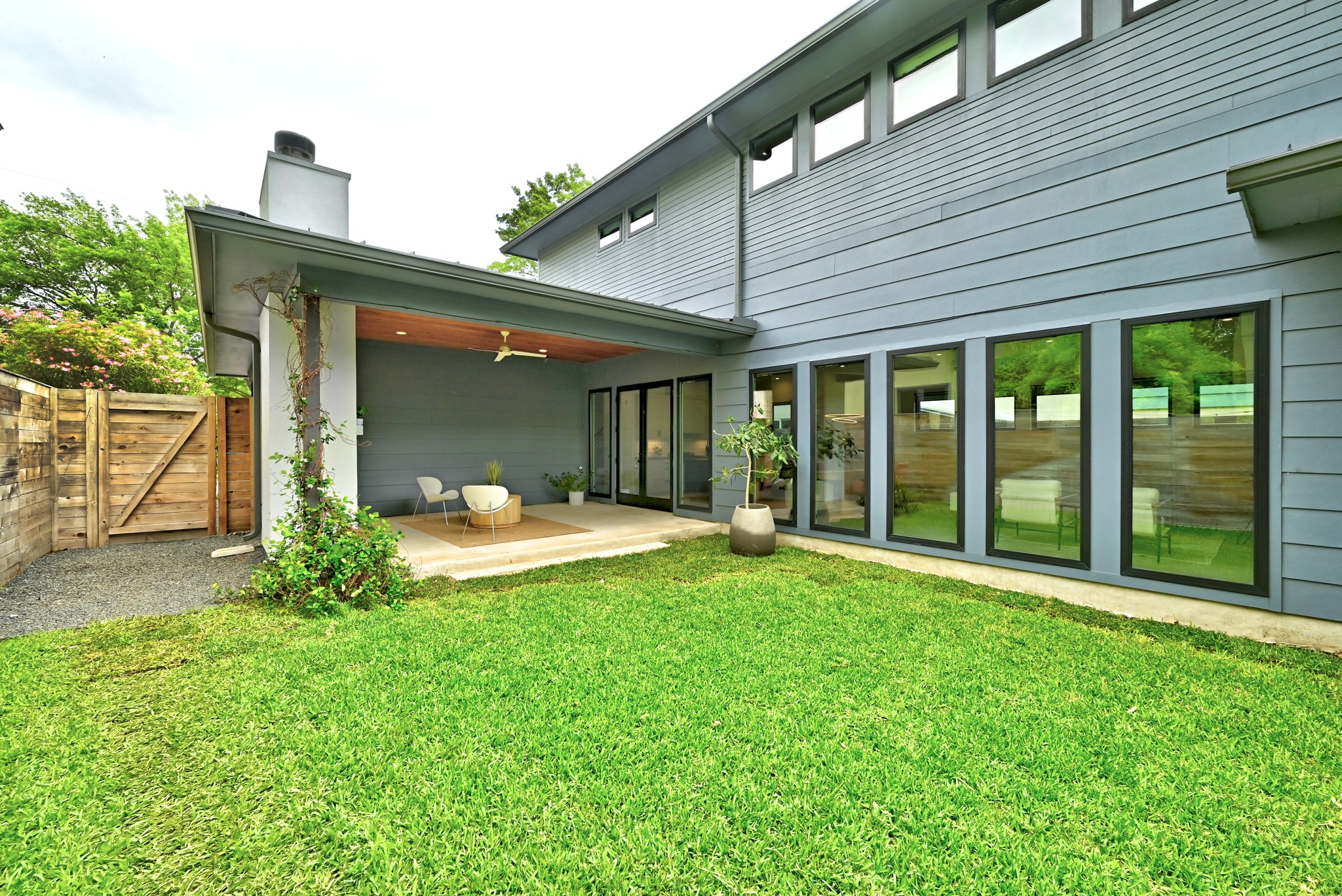 1609 Bauerle Avenue Austin, TX 78704 - Photo 24 of 34 Lush back yard and covered patio off the living area