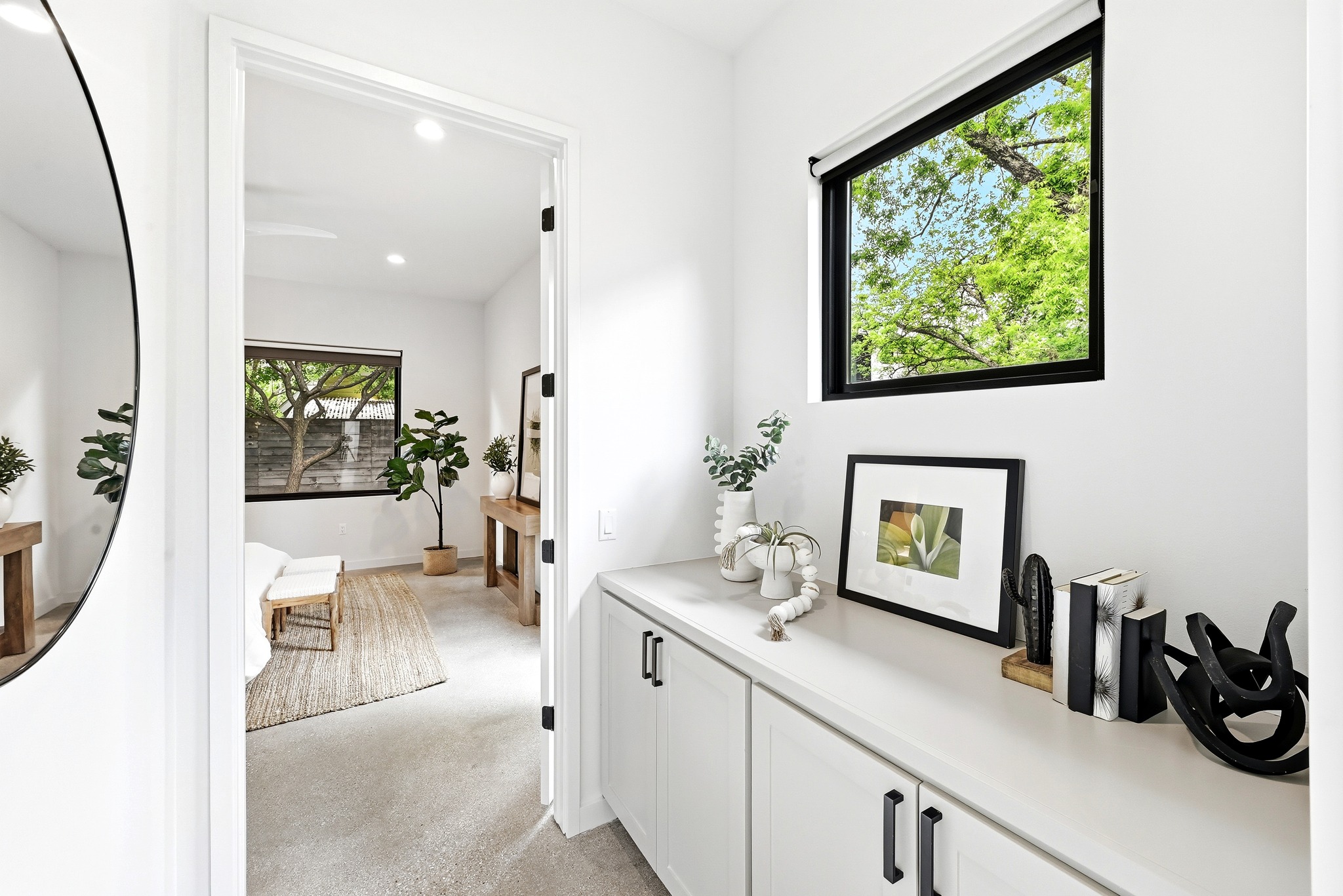 1609 Bauerle Avenue Austin, TX 78704 - Photo 10 of 34 Hallway leading into the Primary Suite with custom built ins