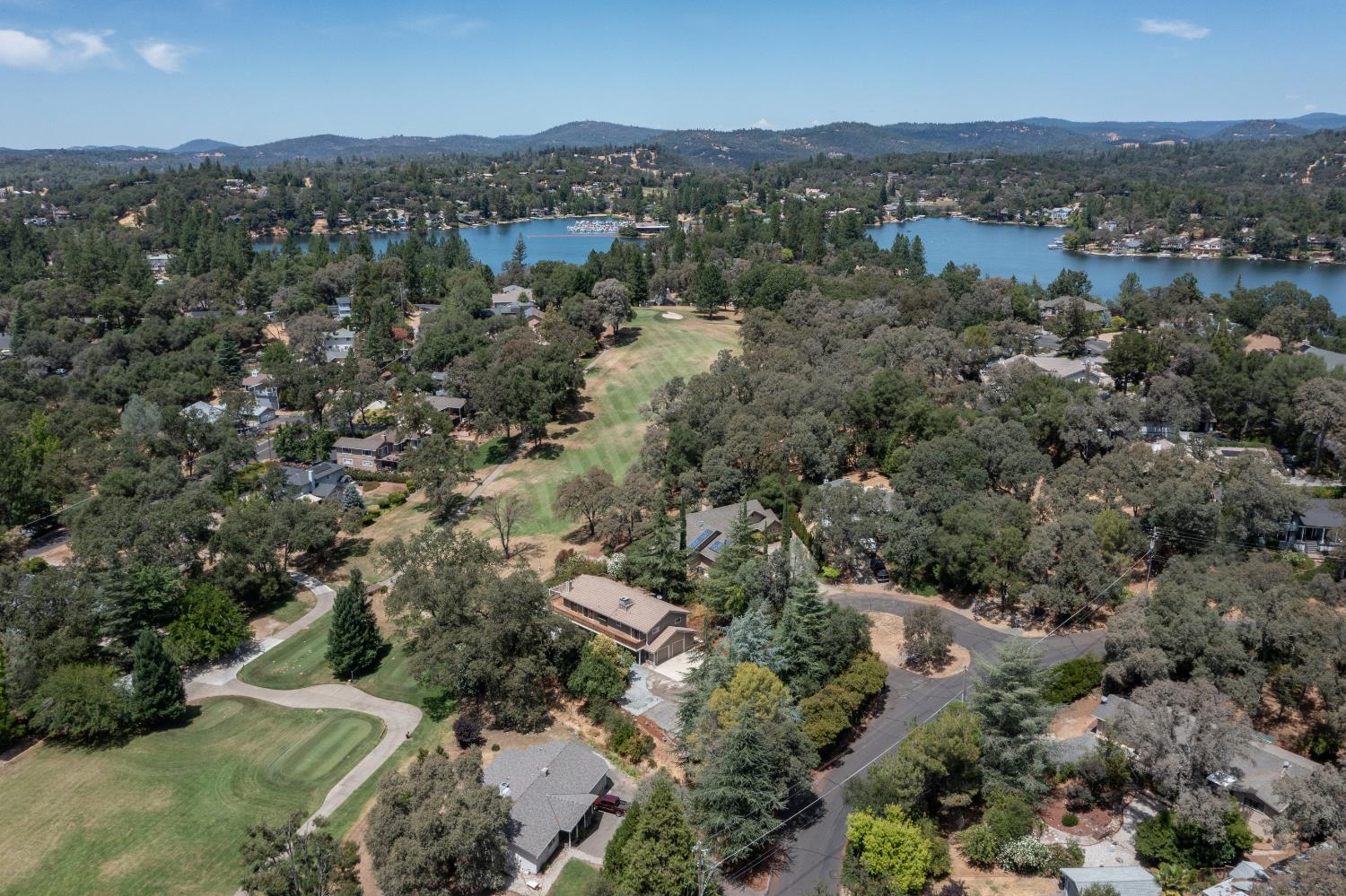 24126 Green Valley Road Auburn, CA 95602 - Photo 19 of 65 an aerial view of residential house with outdoor space and trees all around