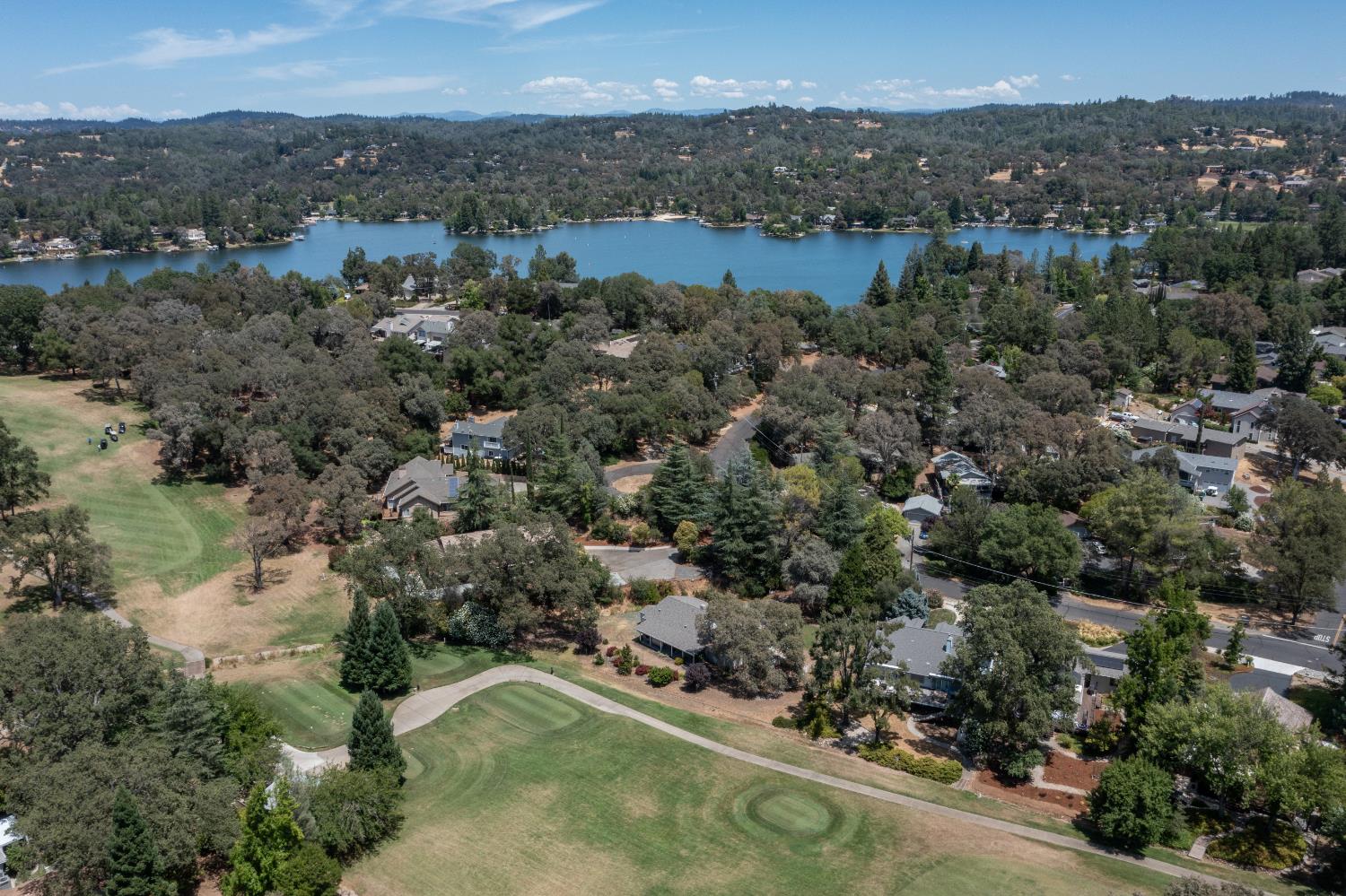 24126 Green Valley Road Auburn, CA 95602 - Photo 20 of 65 an aerial view of residential houses with outdoor space and trees