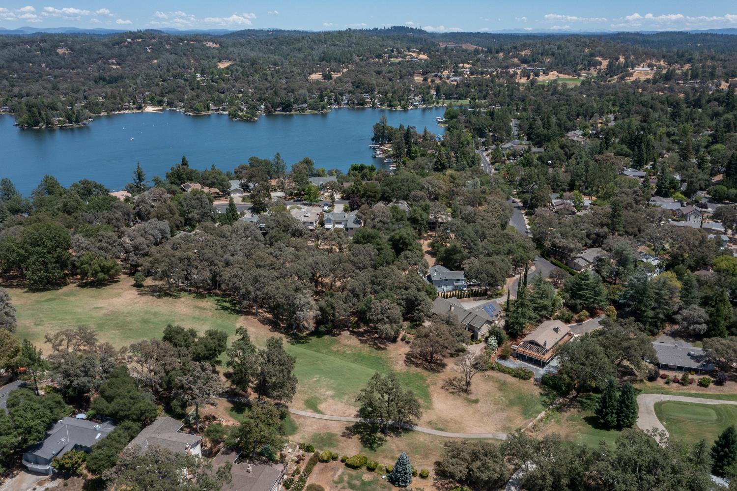 24126 Green Valley Road Auburn, CA 95602 - Photo 27 of 65 an aerial view of a houses with a yard and lake view