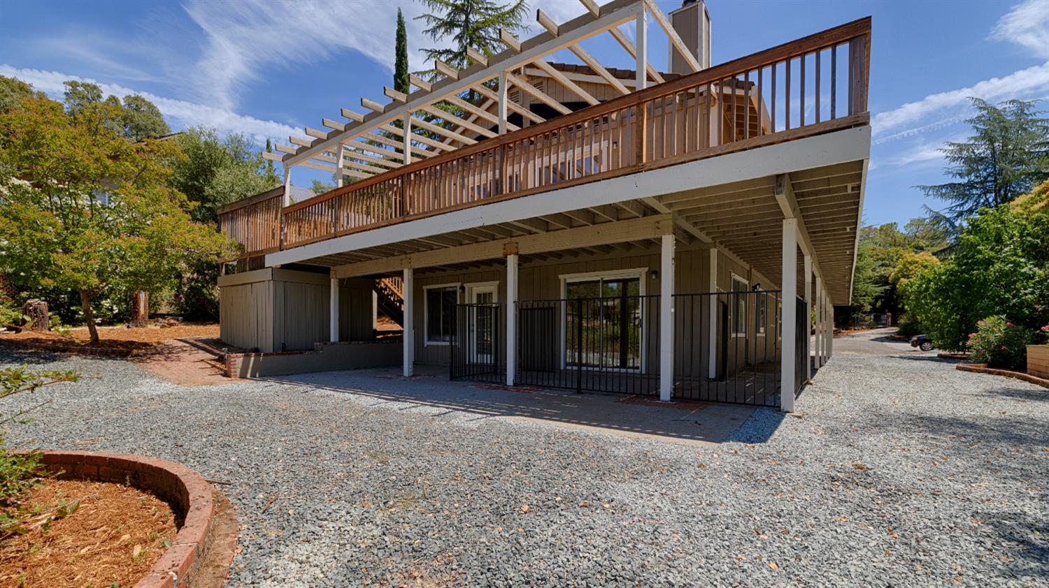 24126 Green Valley Road Auburn, CA 95602 - Photo 29 of 65 a view of a house with a porch