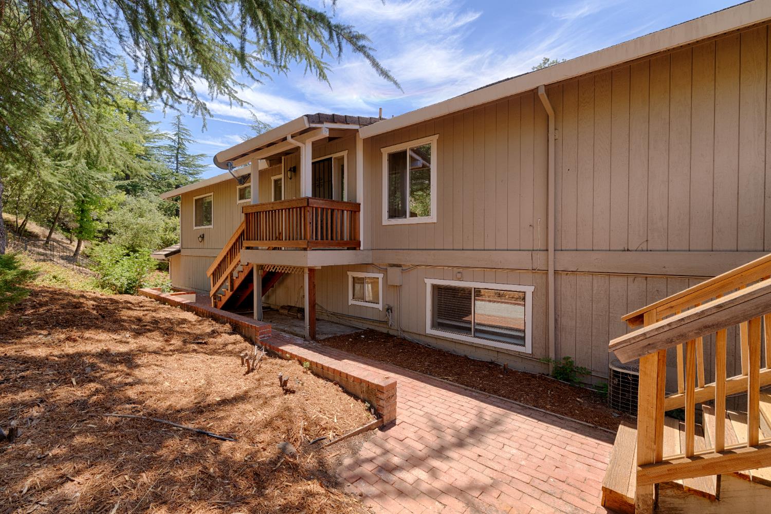24126 Green Valley Road Auburn, CA 95602 - Photo 30 of 65 a view of a house with a yard