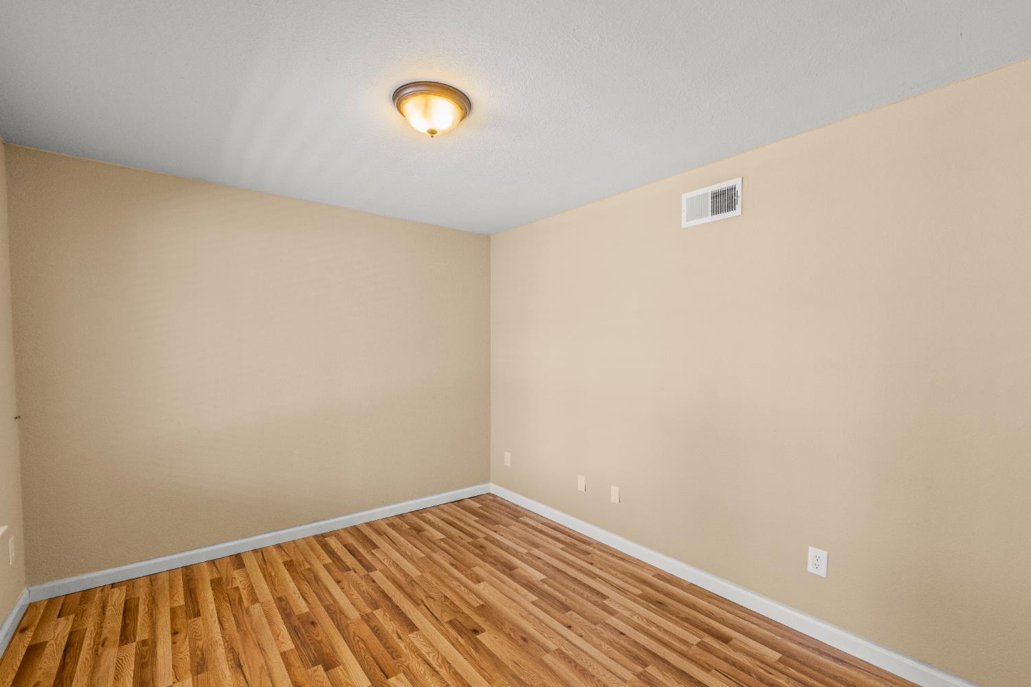 24126 Green Valley Road Auburn, CA 95602 - Photo 39 of 65 a view of a room with wooden floor
