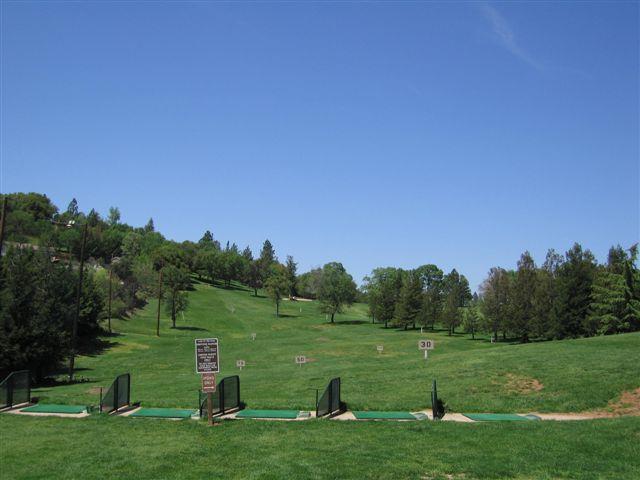 24126 Green Valley Road Auburn, CA 95602 - Photo 49 of 65 a view of a golf course with a lake