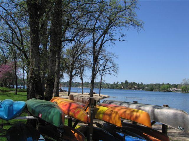 24126 Green Valley Road Auburn, CA 95602 - Photo 50 of 65 a view of a lake with couches and city view