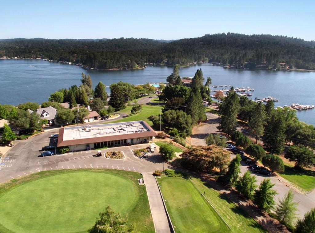 24126 Green Valley Road Auburn, CA 95602 - Photo 53 of 65 an aerial view of a house with swimming pool and mountains