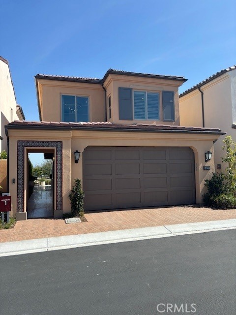 136 Pisano Irvine, CA 92618 - Photo 1 of 4 a front view of a house with a yard