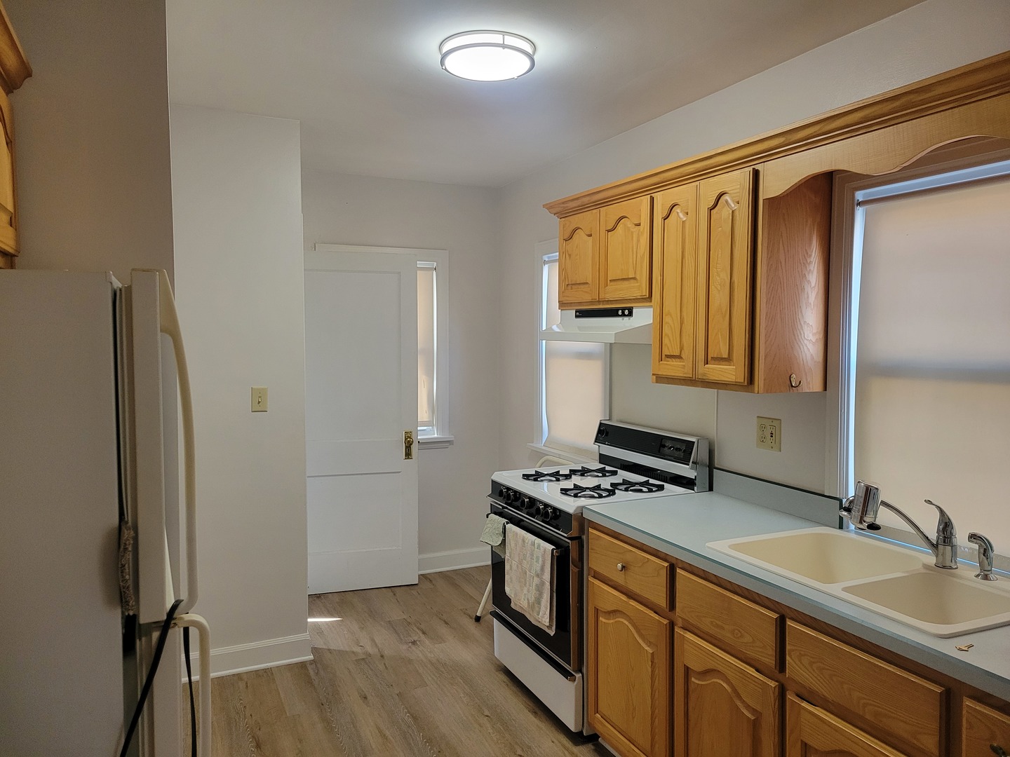 3607 26th Street Moline, IL 61265 - Photo 7 of 12 a kitchen with stainless steel appliances a sink stove and refrigerator