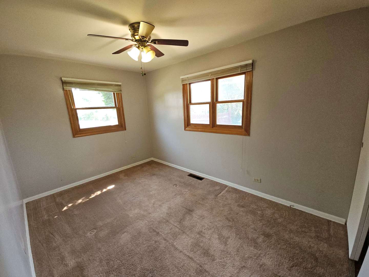 75 Bode Road Hoffman Estates, IL 60169 - Photo 18 of 19 a view of an empty room with a window