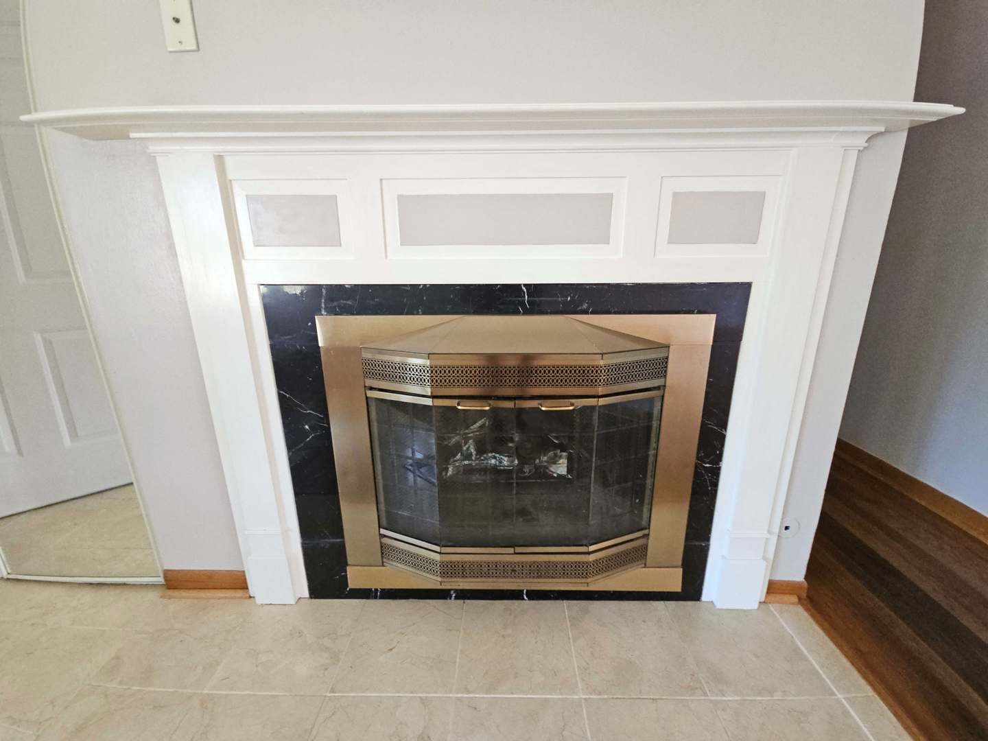 75 Bode Road Hoffman Estates, IL 60169 - Photo 7 of 19 a living room with a fireplace