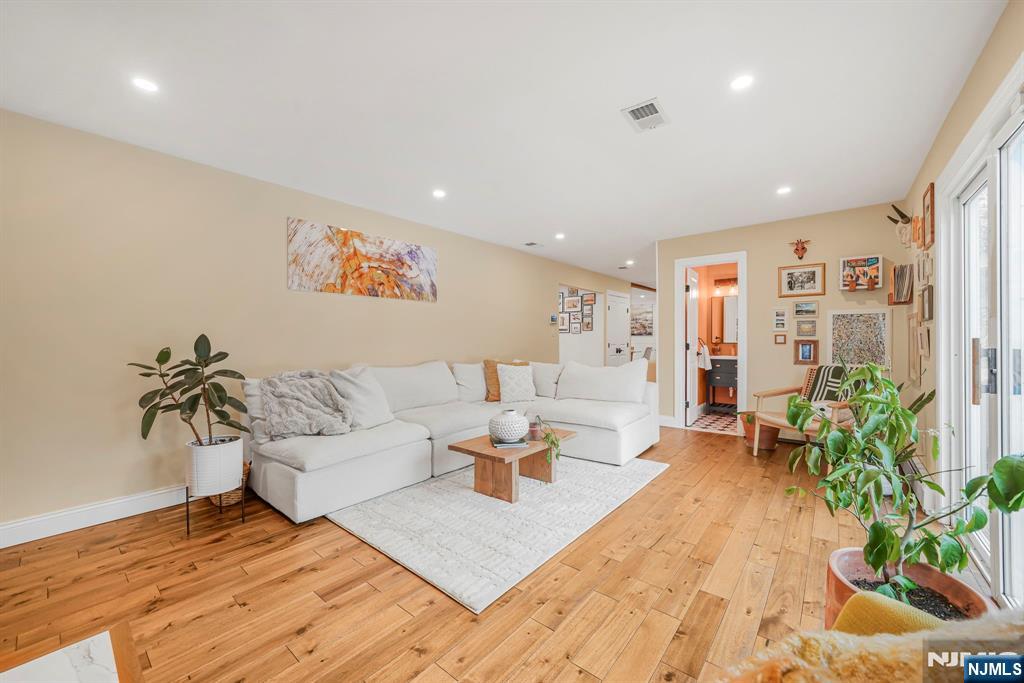 10 Winonah Avenue Wayne, NJ 07470 - Photo 13 of 41 a living room with furniture and flowers