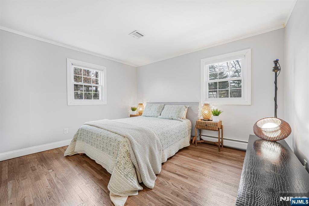 10 Winonah Avenue Wayne, NJ 07470 - Photo 25 of 41 a bedroom with a bed and a window