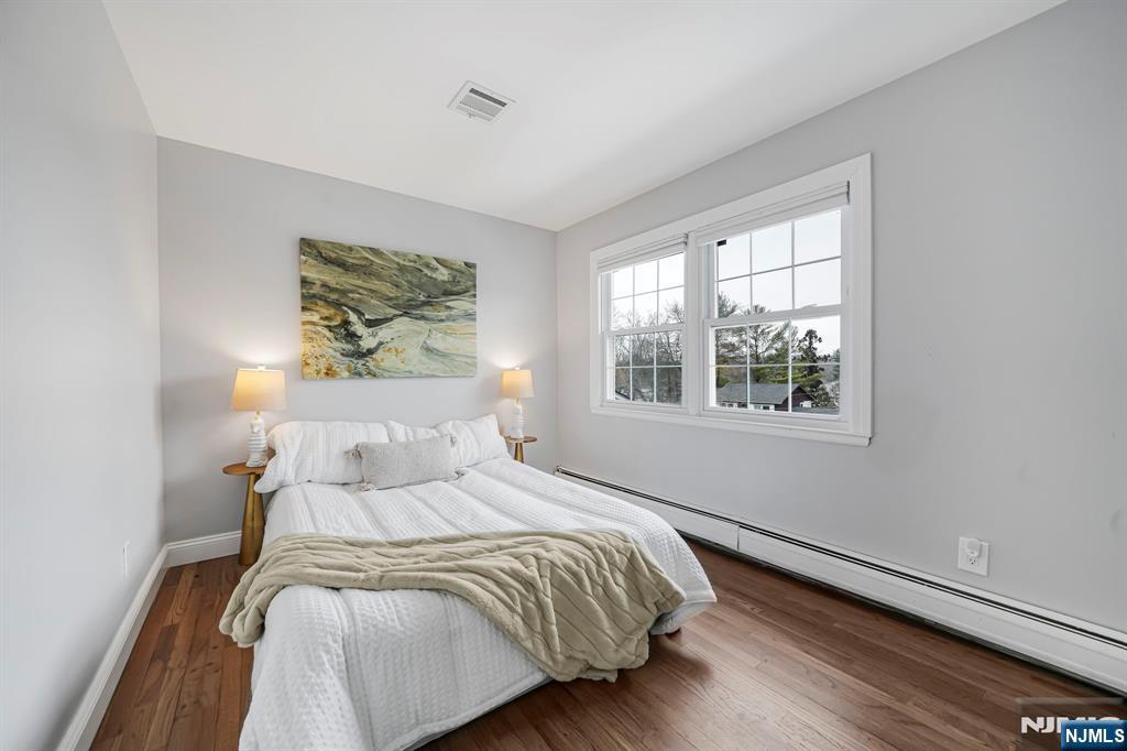 10 Winonah Avenue Wayne, NJ 07470 - Photo 27 of 41 a bedroom with a bed and a window