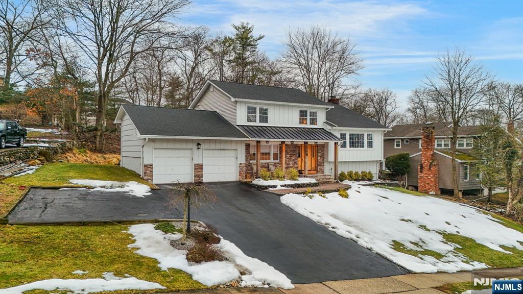 10 Winonah Avenue Wayne, NJ 07470 - Photo 3 of 41 a front view of a house with garden