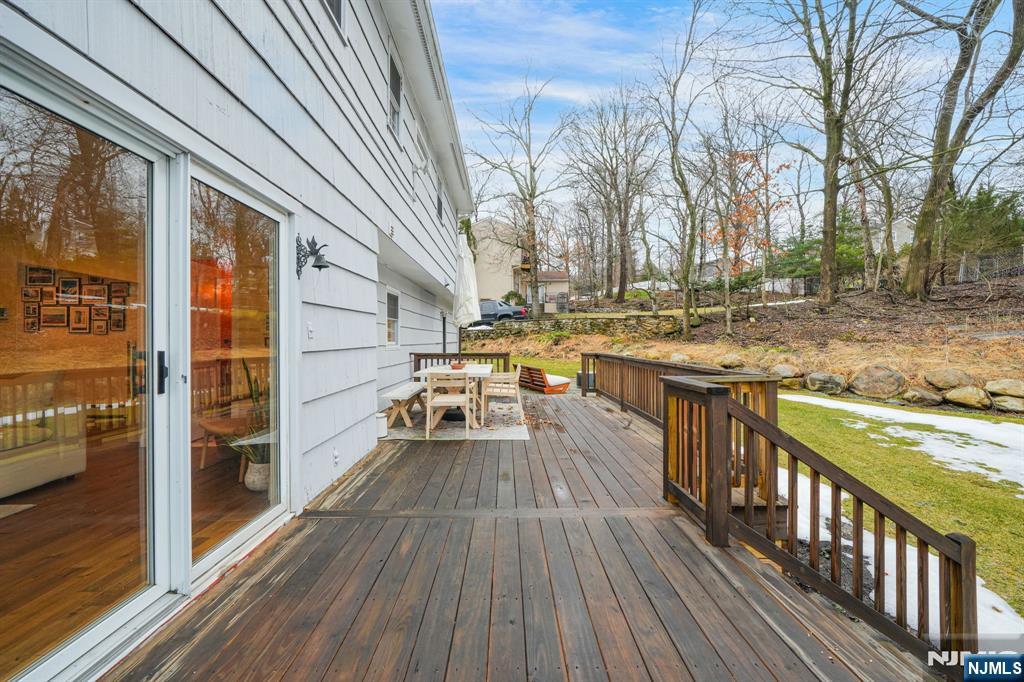 10 Winonah Avenue Wayne, NJ 07470 - Photo 32 of 41 a view of a balcony with wooden floor and fence