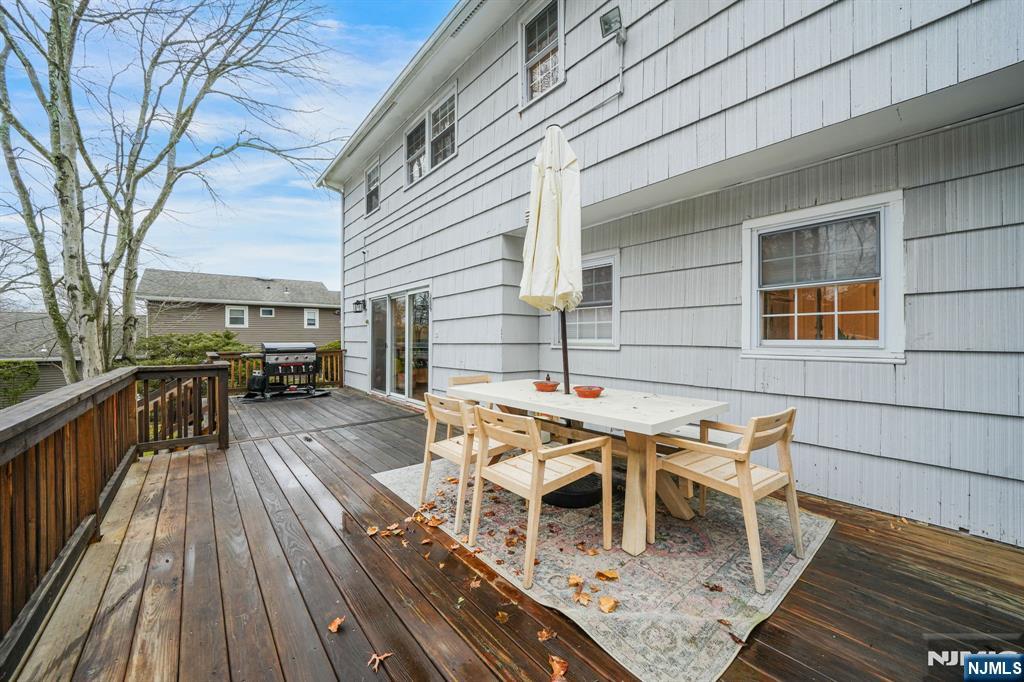 10 Winonah Avenue Wayne, NJ 07470 - Photo 33 of 41 a patio with wooden floor and outdoor seating