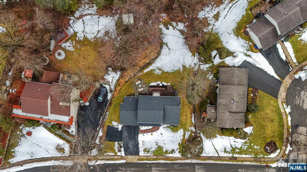 10 Winonah Avenue Wayne, NJ 07470 - Photo 40 of 41 an aerial view of a residential apartment building with a yard and parking space