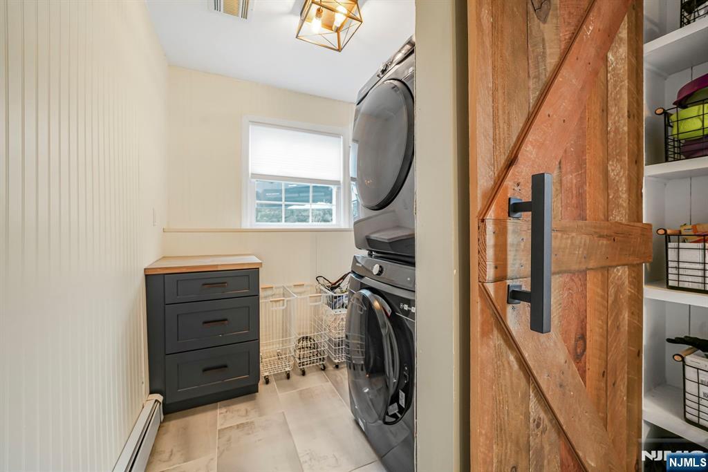 10 Winonah Avenue Wayne, NJ 07470 - Photo 10 of 41 a view of walk in closet with clothes and shoes