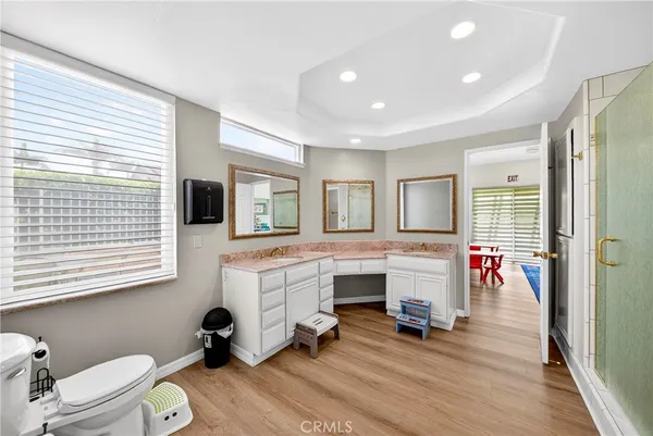 a living room with furniture and flat screen tv