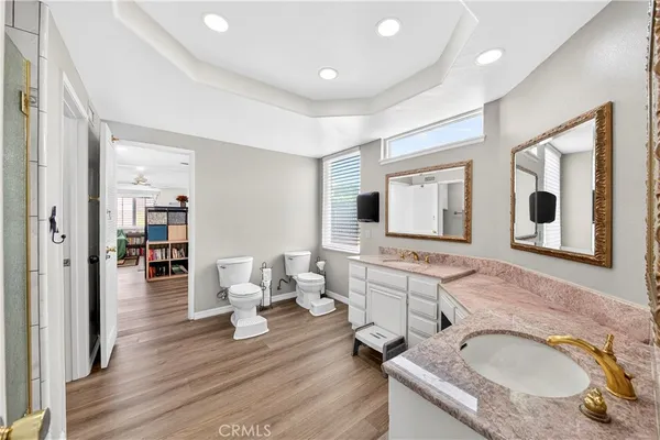 a bathroom with a shower and a bathroom