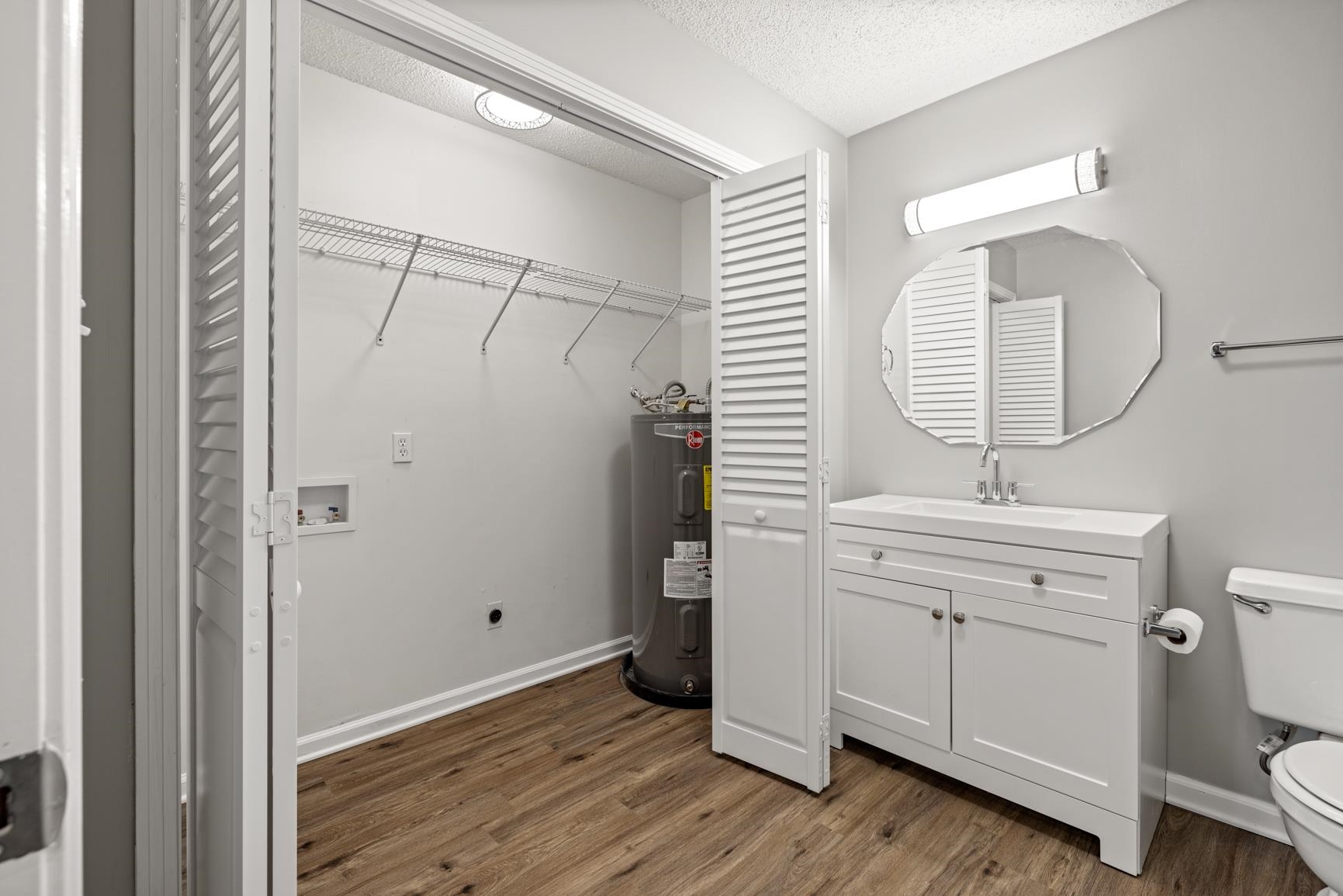 183 Bringle Road Covington, TN 38019 - Photo 19 of 23 New water heater in laundry closet