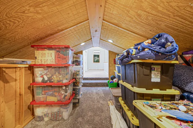 a front view of a house with outdoor seating