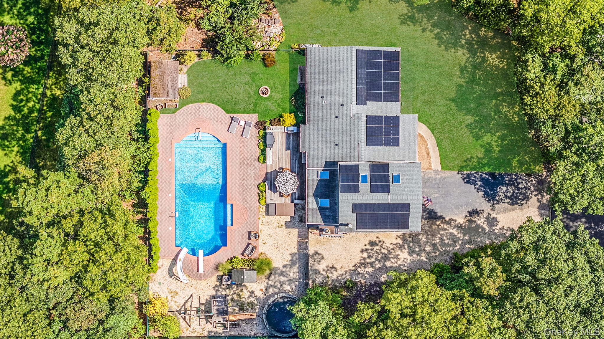 5 Hastings Drive Ridge, NY 11961 - Photo 3 of 31 front view of a house with a yard