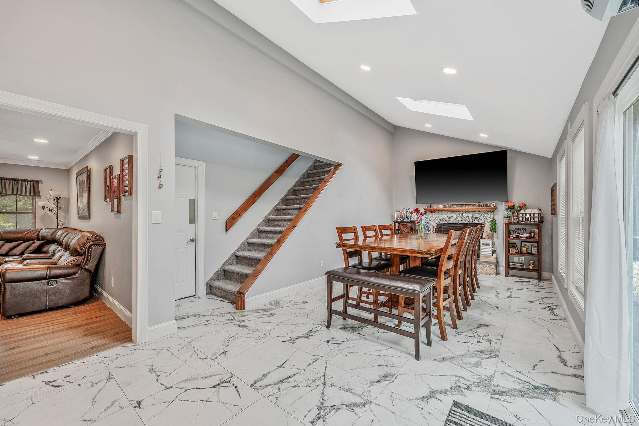 5 Hastings Drive Ridge, NY 11961 - Photo 9 of 31 a view of a hallway with seating area