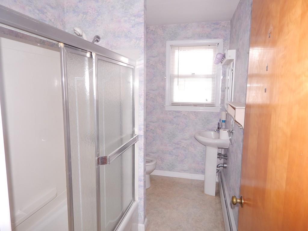 25 Isabel Street Fall River, MA 02721 - Photo 14 of 17 a bathroom with a shower and a sink