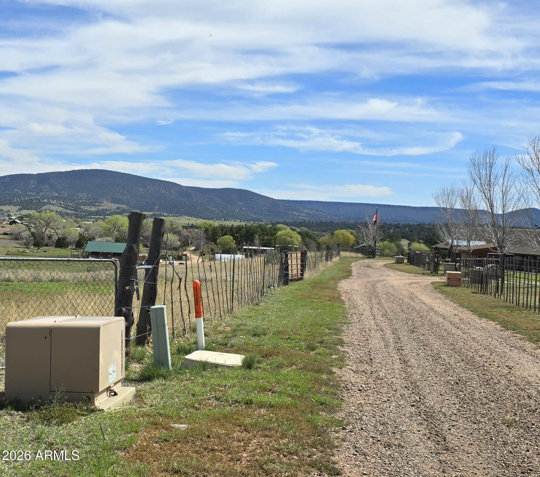 2 M Elk Ridge Road, Unit 3 Young, AZ 85554 - Photo 6 of 7 a view of a lake with a yard