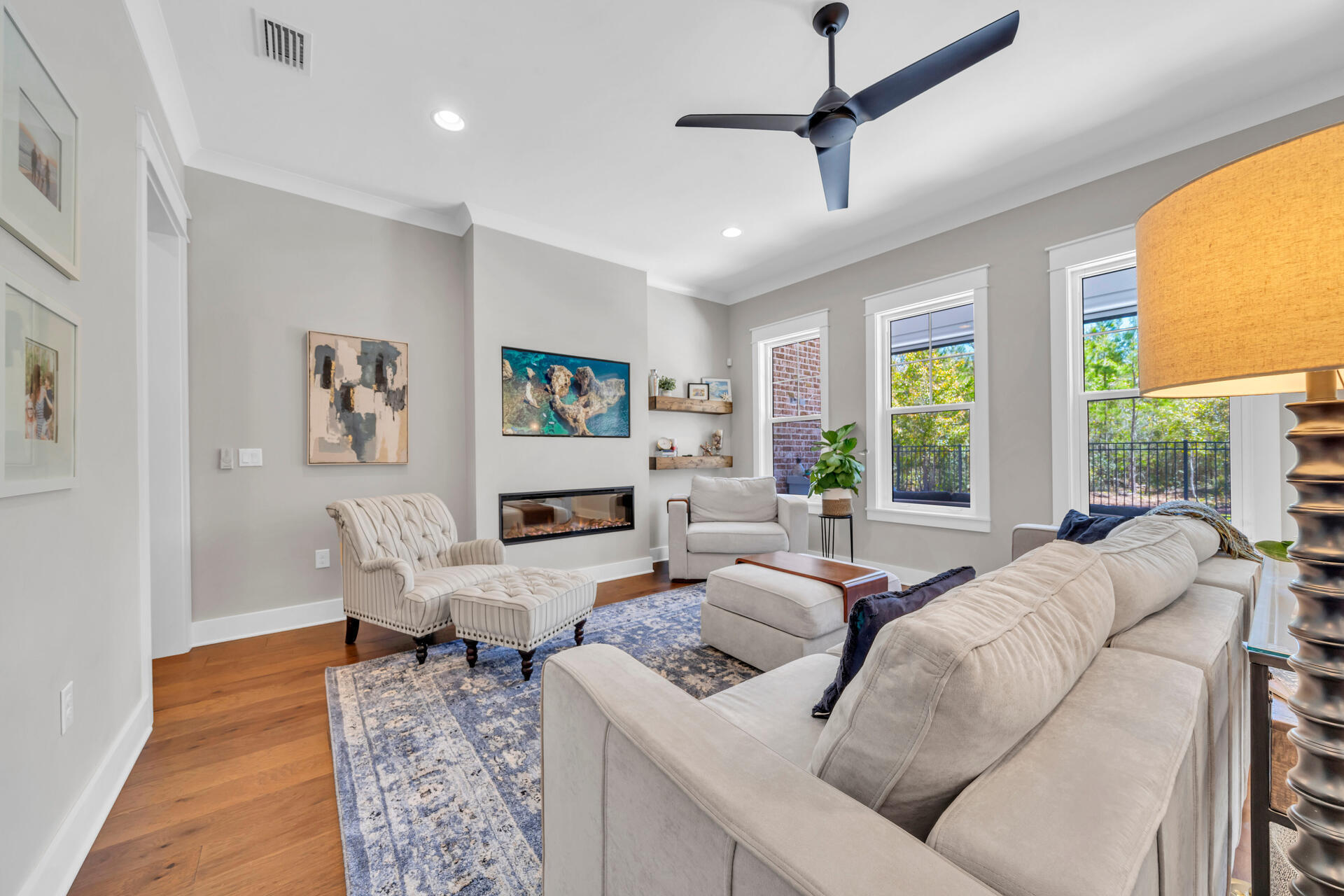 1244 Elderflower Drive Niceville, FL 32578 - Photo 25 of 74 a living room with furniture and a large window